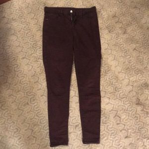 Maroon ankle length Topshop moto pants.